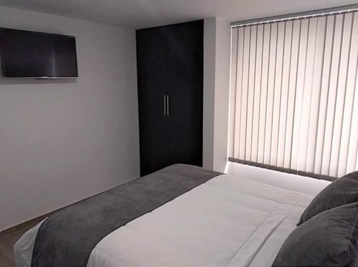 Hotel Jardin 38 Pasto Cameră foto